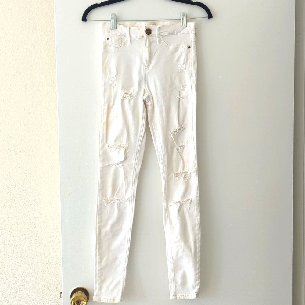 White Skinny Jeans with Rips and Copper Button River Island